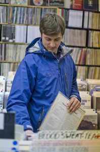 Customer Alex Kleim selects a record at Jerry’s. Photo by Alyssa Kramer